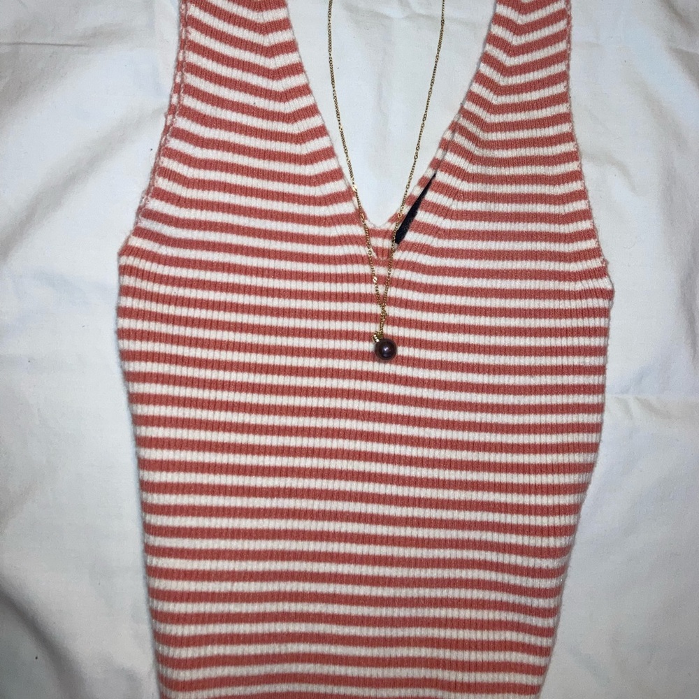 Necklace not included